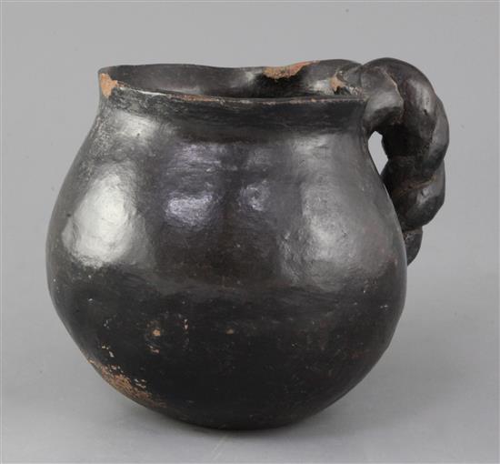 A Midlands blackware lead-glazed pottery jug, 16th century, height 14.5cm